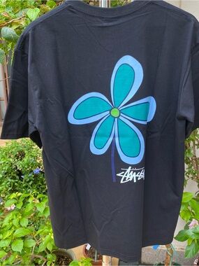 Stussy Black Tee with Blue & Teal Flower Graphic
